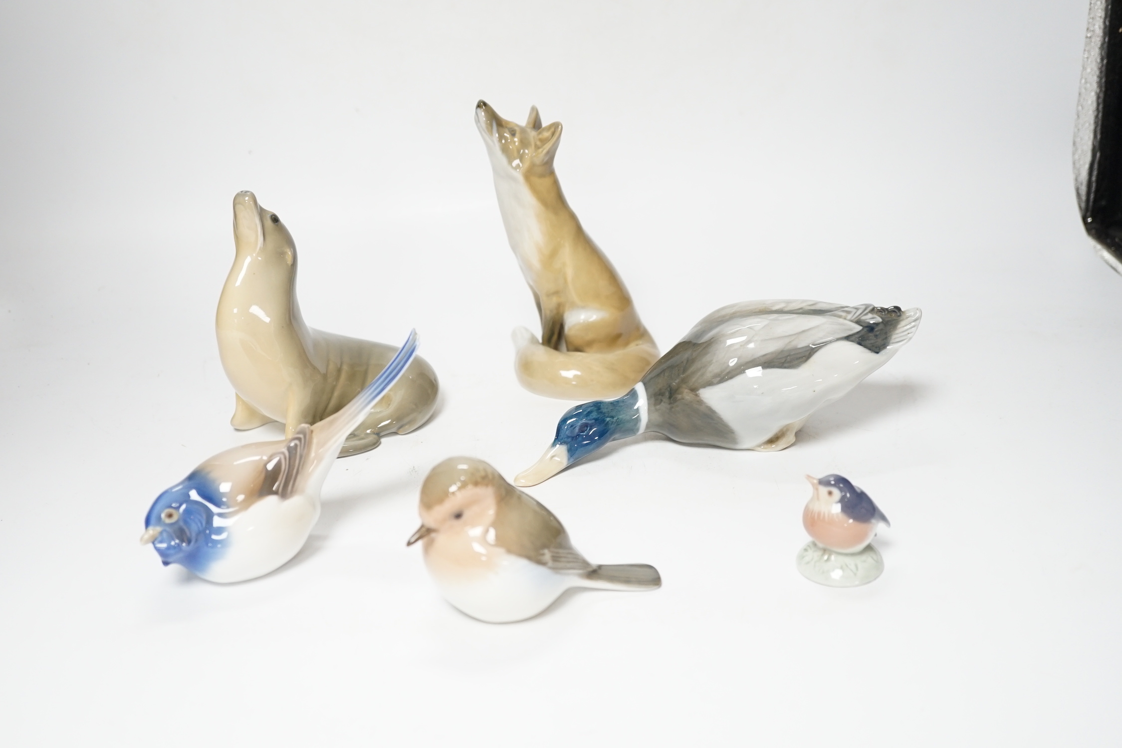 Six Royal Copenhagen animal models including fox, duck and seal, largest 15cm high